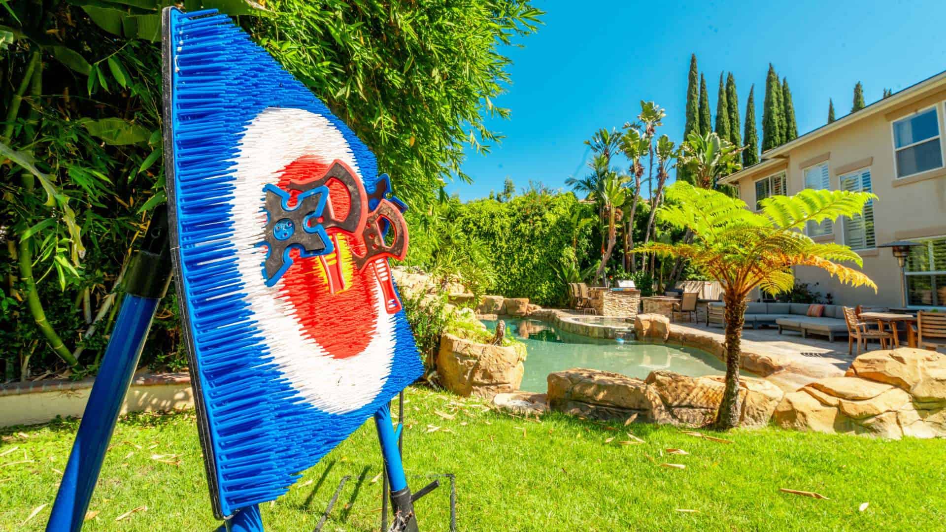 Recreational area at Dana Shores facility featuring a stylish dart set, offering relaxing amenities as part of comprehensive treatment at a Drug Rehab in Orange County.