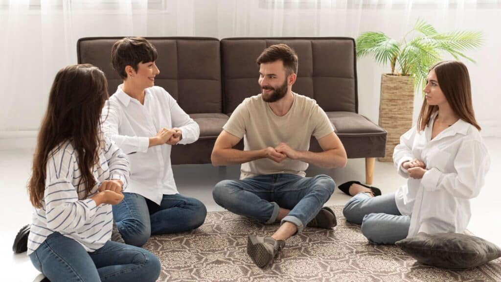 Man and women engaging in holistic therapy at Dana Shores Recovery, promoting healing through Alcohol Rehab in Orange County