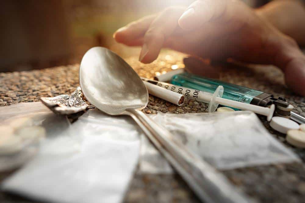 Close-up of drug paraphernalia highlighting the need for heroin rehab in Orange County.